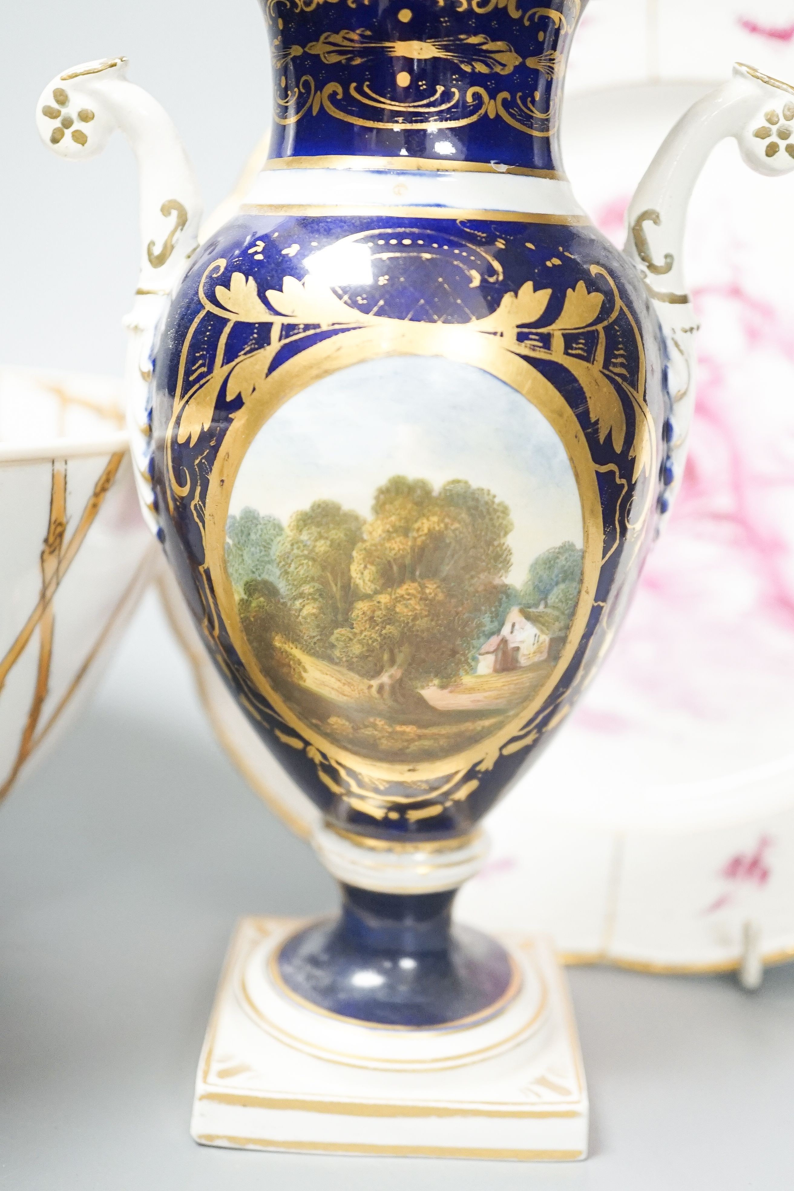 A Furstenburg dessert plate, later painted in puce, signed in reverse ‘W Munscher Stuttgart 1875’, 14.75cm an early 19th century Derby vase and a chinoiserie porcelain bowl (3)